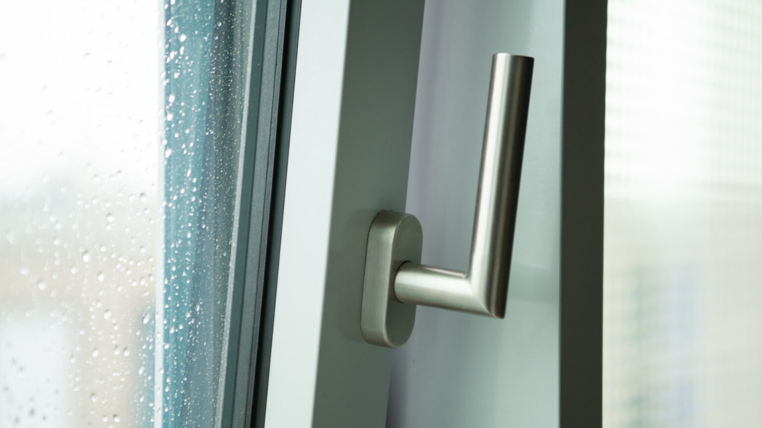 stylish-chrome-handle-dark-window-frame-1536x864.jpg